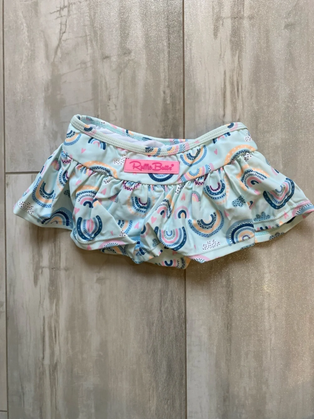 NWT RuffleButts Pastel Chase the Rainbow Bow Top Skirted Bikini girls 18-24M